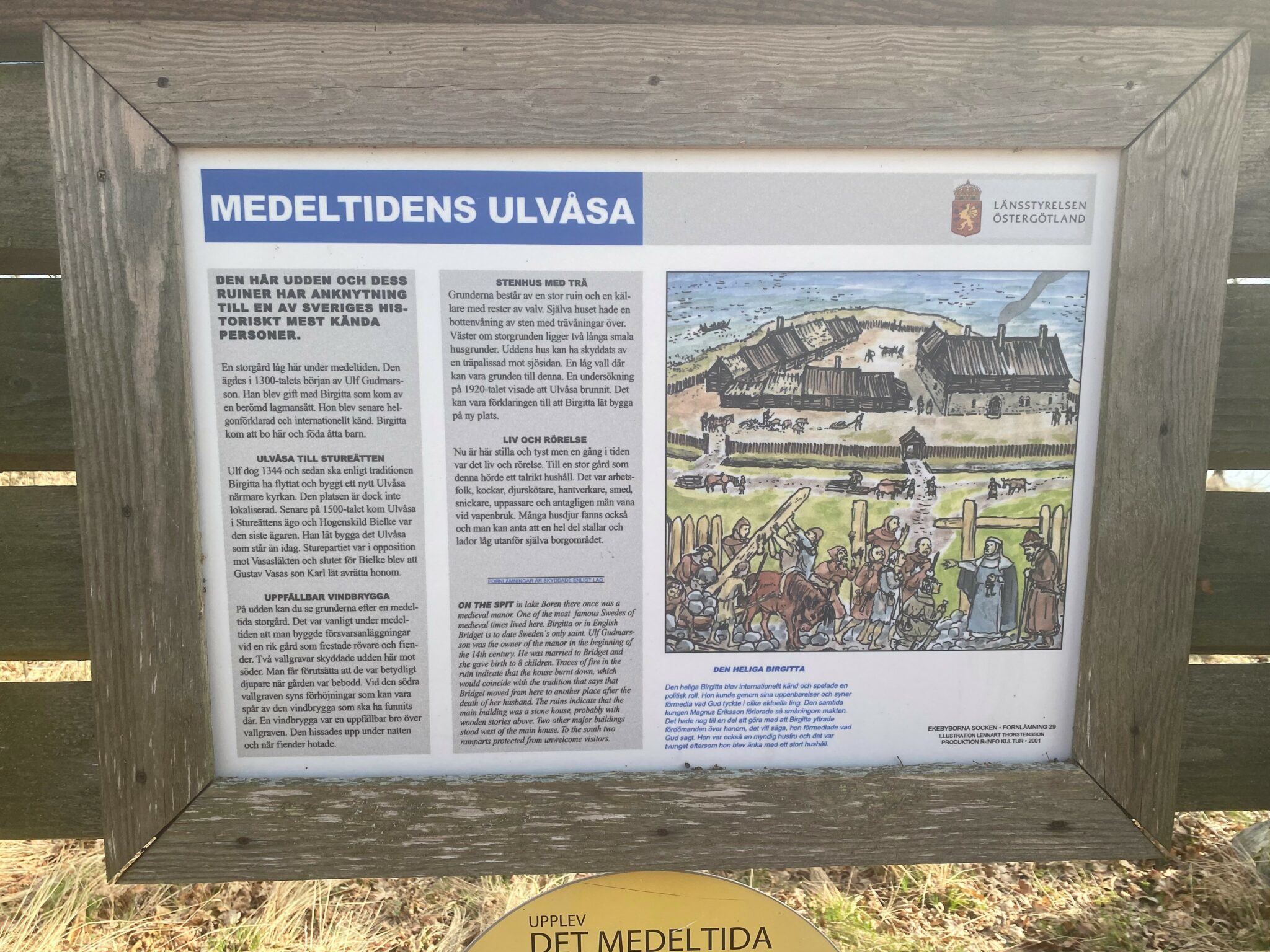 En bild på en skylt som informerar "Medeltidens Ulvåsa".